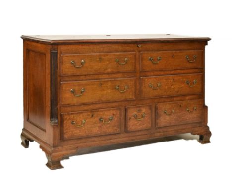 George III oak and mahogany 'Lancashire' mule chest, the hinged crossed banded top over two banks of two crossbanded false dr