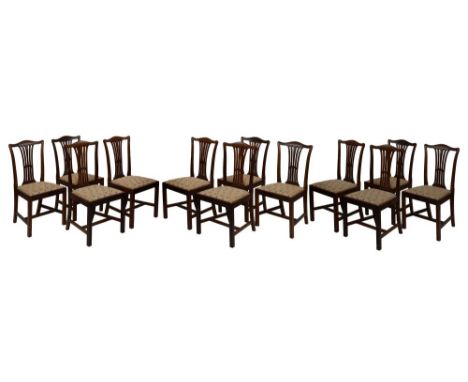 Set of twelve 19th Century Country Chippendale-style mahogany dining chairs, circa 1900, each with humped top rail over pierc