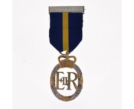 Elizabeth II The Army Emergency Reserve decoration 1964, with ribbon   Condition: Signs of light scratching to both sides of 