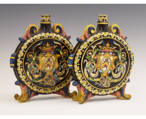 Pair of 19th Century French Gien faience pottery vases, each of moon flask form decorated with an armorial shield and martial