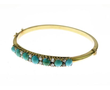 Turquoise and diamond hinged bangle, in unmarked gold coloured metal, the seven graduated cabochon with graduated pairs of ol