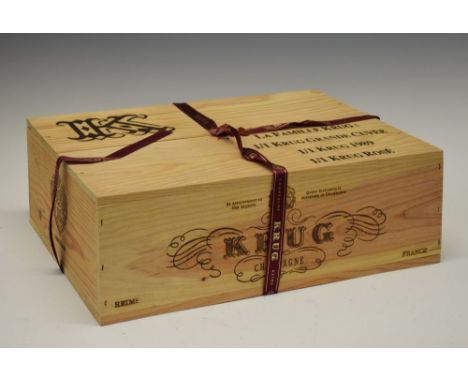 La Famille Krug sealed presentation case containing bottle Krug Grande Cuvee Champagne, bottle Krug Brut Champagne 1989 vinta