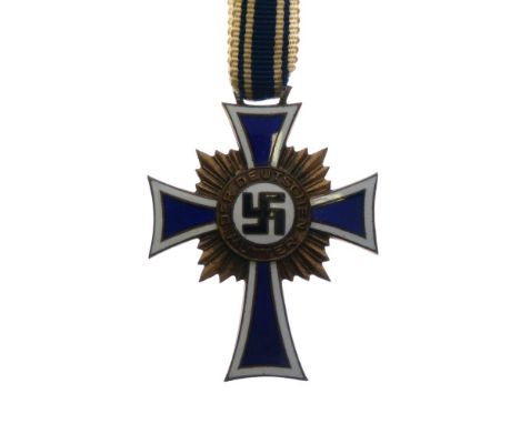 German Third Reich Cross of Honour of the German Mother Medal in bronze having blue and white enamel decoration to front with