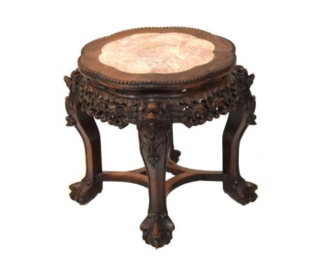 Early 20th Century Chinese or Burmese marble-topped hardwood occasional table or vase stand, with eight-lobed inset marble to