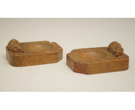 Workshop of Robert Thompson of Kilburn North Yorkshire - A pair of 'Mouseman' oak ashtrays, each of oblong form with carved m