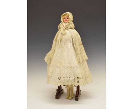 Early 20th Century bisque headed 'Parasol Doll', in lace clothing, doll having light blonde hair and blue glass eyes, measure