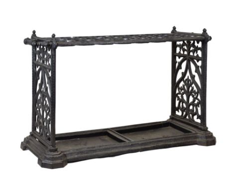 Good Victorian cast iron stick or umbrella stand, the rectangular frame with three rows of eight divisions between carry hand