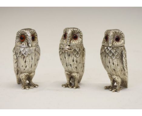 Elizabeth II silver three-piece novelty condiment set, each in the form of an owl with inset glass eyes, comprising salt, pep