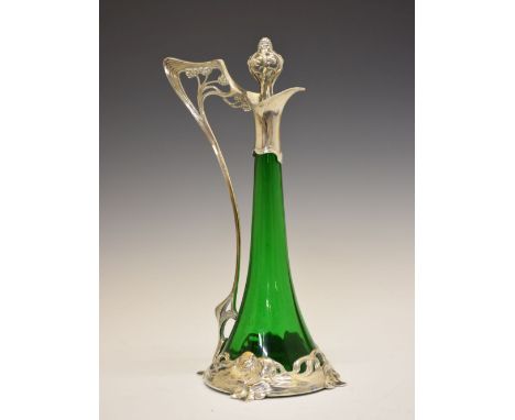 Art Nouveau WMF claret jug and stopper, No.191, with trumpet-form green glass body, pierced berry stopper, whiplash handle an