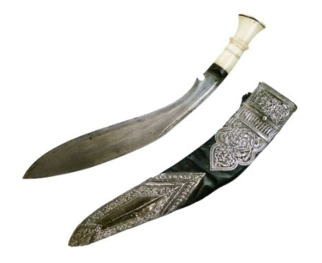 Silver mounted Nepalese Kukri, late 19th Century, with single edged leaf shaped blade with two narrow fullers along each side