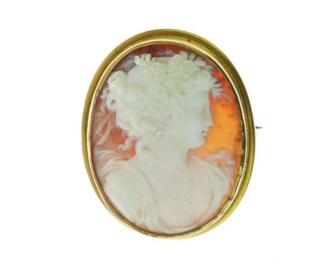 Victorian shell cameo brooch, carved as a classical female in profile, the plain mount tagged '15c', 4.6cm x 3.8cm, 14.8g gro