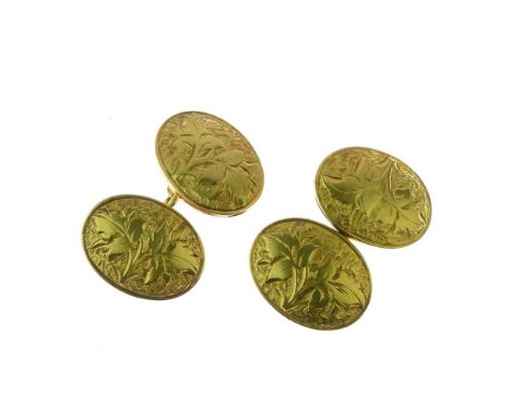 Pair of Victorian 18ct gold cufflinks, Birmingham 1877, the oval engraved panels 1.7cm x 1.3cm, 13.7g gross   Condition: Very