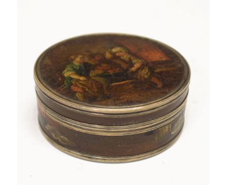 Late 18th/early 19th Century Continental tortoiseshell snuff box of circular form with white metal banding, the push-on cover
