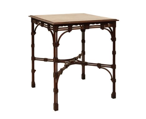 Early 20th Century Chippendale Revival mahogany occasional table, the moulded square top on four blocked cluster column suppo