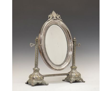 Brothers Henneberg, Warsaw, Poland - Late 19th Century silver-plated brass dressing mirror, the bevelled oval plate within be
