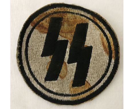 A German WWII style Ersatz Waffen SS PT vest patch.   Approx. 9cm diameter.