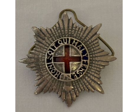 A vintage Coldstream Guards Warrant Officers cap badge.  With central enamelled panel and 2 lug fixing to reverse. 