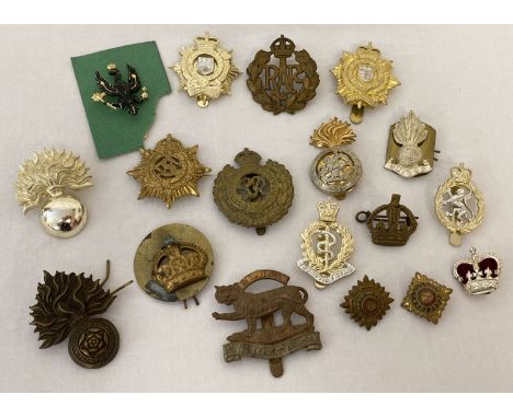 A collection of vintage and modern military badges.  To include Royal Fusiliers, Royal Engineers and Royal Leicestershire reg
