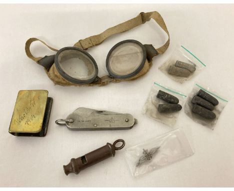 A small collection of military related items. To include a 1940 whistle by Adie Bros, Birmingham  with war department arrow, 