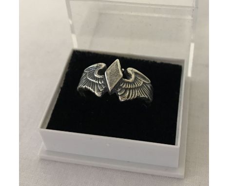 A WWII style US Woman's Airforce Service Pilots (W.A.S.P) white metal ring.  No hallmarks but acid tests as silver. May have 