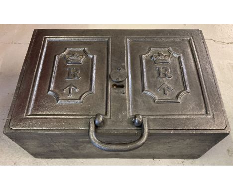 A Victorian cast iron 2 handled revenue strong box.  Crown over 'R' and broad arrow or "Crows Foot" mark, in relief to each p