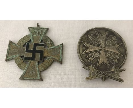 2 WWII style German medals.  No ribbon, one medal has a broken bale. 