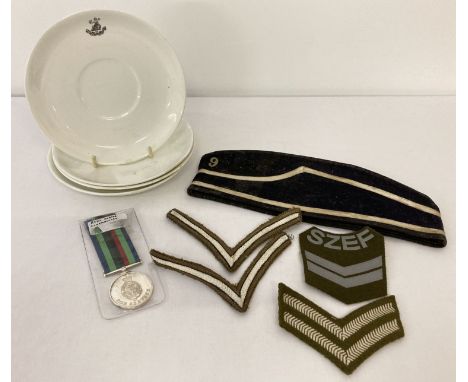 A small collection of mixed military items.  Comprising: A Royal Navy side cap with metal No 9 to side, 4 x 5th Bn, Norfolk r