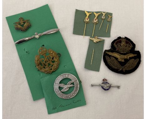 A collection of vintage RAF badges to include cap badges, stick pins and bullion patch.  Badges to include: Air Training corp