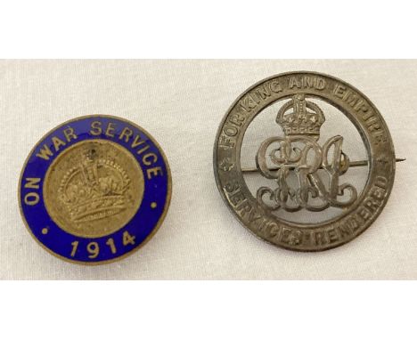 2 WWI service badges, one with blue enamel detail.  