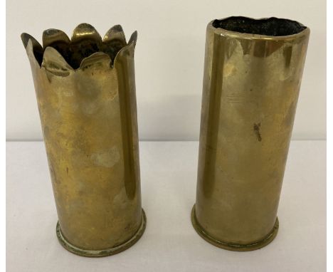 2 vintage post war shell cases, one dated 1956.   Both approx. 18cm tall.