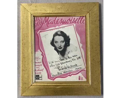 A framed and glazed vintage song sheet "All's Well Mademoiselle" with facsimile signature and    message to the troops fighti