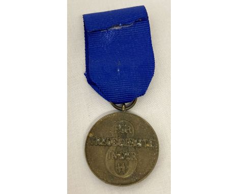 A WWII style SS 8 year service medal on a blue ribbon.  