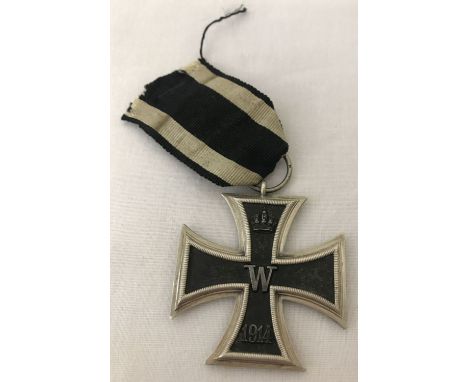 A Imperial German WWI Iron cross medal 2nd class.  3 part construction with iron core. 