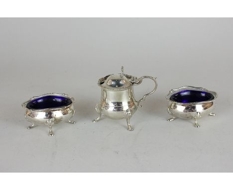 A pair of George V silver oval salts with blue glass liners, maker Walker & Hall, Birmingham 1919, together with a silver mus