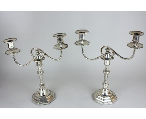 A pair of Edward VII silver two-branch candelabra, makers Hawksworth, Eyre & Co Ltd, Sheffield 1909, of octagonal form, 35cm 