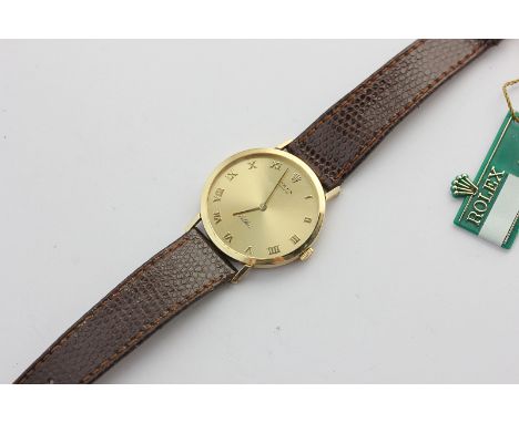 Rolex Cellini, a gentleman's 18ct gold dress wrist watch, applied Roman numerals to the brushed gold dial, manual wind on a b