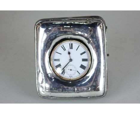 A Goliath chrome cased pocket watch with white enamel dial and Roman numerals, in white metal mounted travel case (a/f)