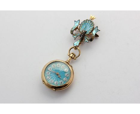 A lady's Swiss 14ct gold and enamel lapel watch on a shell and ribbon bow set with rose cut diamonds