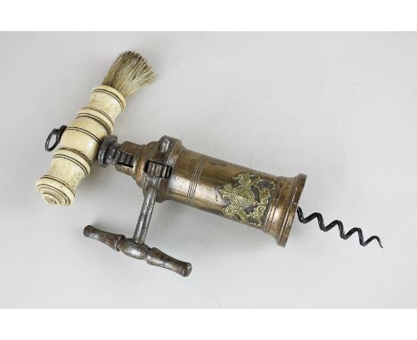 A Thomason type corkscrew with lever action, bone handle and brush