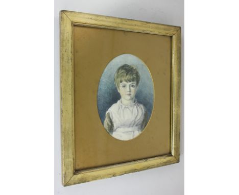 Late 19th/early 20th century school, portrait of a child, watercolour, oval mount, 20cm by 15cm