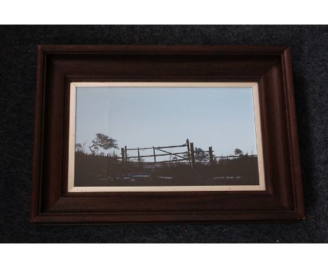 Laurence Roche (b 1944), gate and trees silhouetted against a pale blue sky, 'Gateway - Winter Dawn', oil on board, signed an
