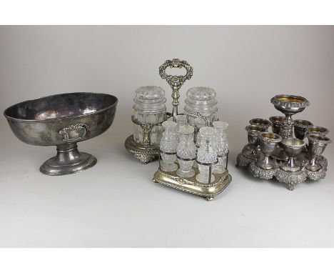 A collection of silver plated tableware to include a six glass cruet stand (a/f), two glass pot stands, an egg stand (missing