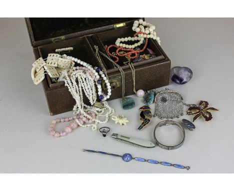 A silver and enamel bracelet, a butterfly brooch, a French silver mesh purse, and a quantity of costume jewellery