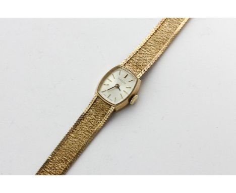 A lady's Tissot 9ct gold bracelet watch,19.8g gross