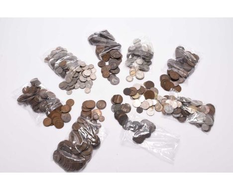 A large collection of UK and foreign silver, cupro-nickel and bronze coinage. (Quantity)