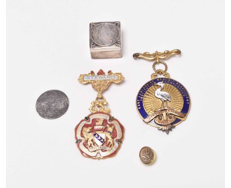 Two gilt metal and enamel Masonic Medals and a small lapel badge dated 2002. Together with two silver coins from the wreck of
