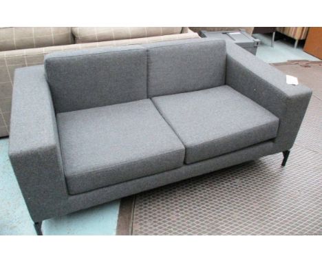 SOFA, two seater, by Hitch Mylius in grey woolen fabric on metal supports, 164cm L.