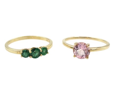 Gold three stone emerald ring and a gold single stone pink danburite ring, both hallmarked 9ctCondition Report:Approx 3.45gm,