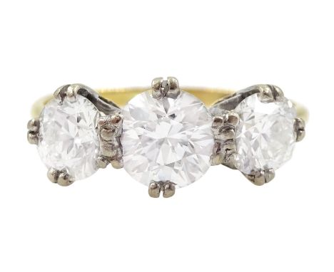 18ct gold three stone round brilliant cut diamond ring, total diamond weight approx 1.95 caratCondition Report:Approx 2.3gm, 