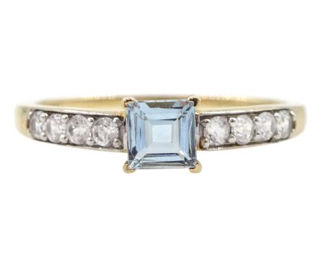 9ct gold square cut aquamarine ring, with white zircon shoulders, hallmarkedCondition Report:Approx 1.85gm, size R-S, good co
